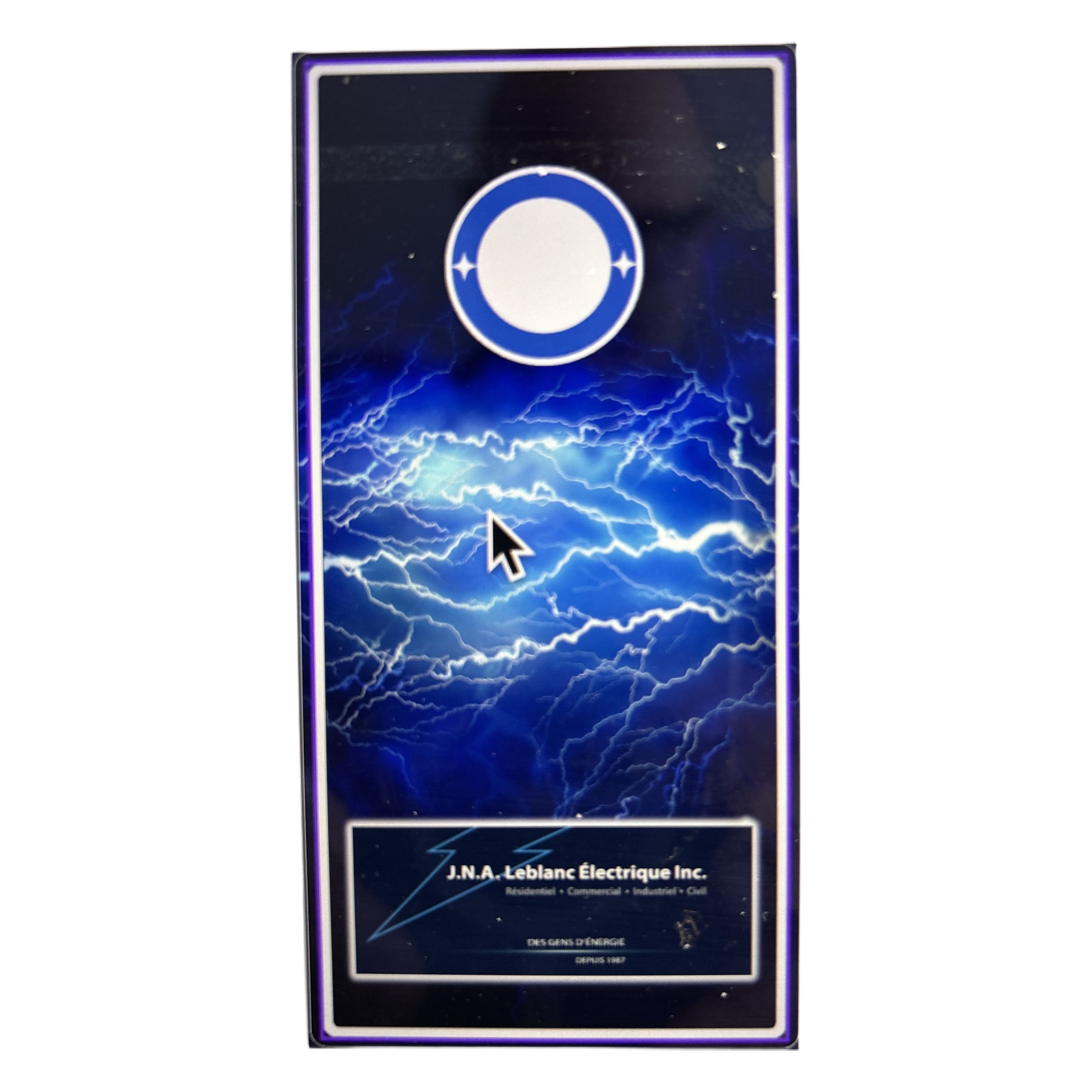 Tall vertical sign with blue lightning background and a circular blue logo, advertising J.N.A. Leblanc Électrique Inc.